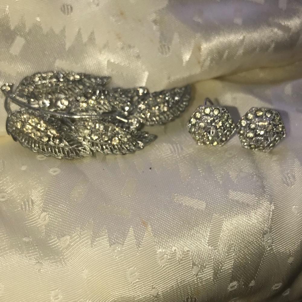 Antique brooch with matching clip on earrings